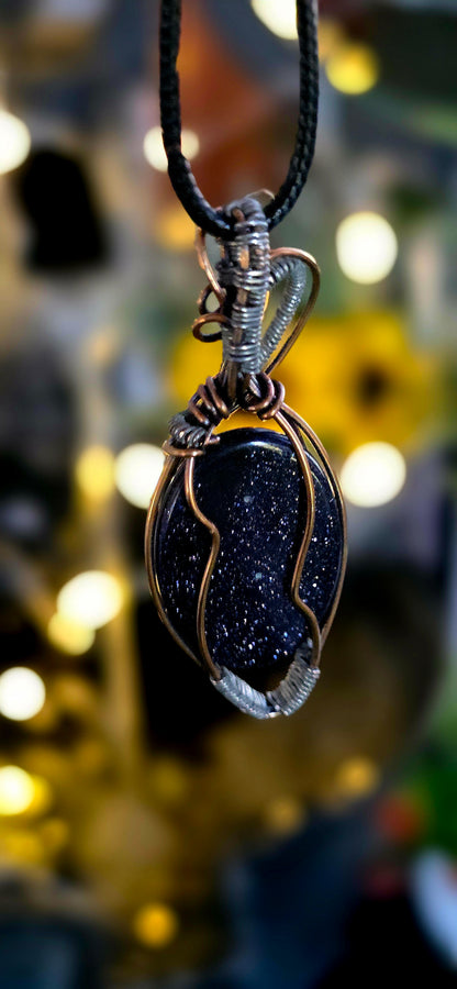 The Blues – Handcrafted Blue Sandstone Pendant with Copper & Steel Weave
