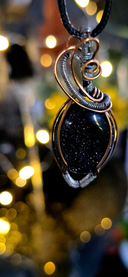 The Blues – Handcrafted Blue Sandstone Pendant with Copper & Steel Weave