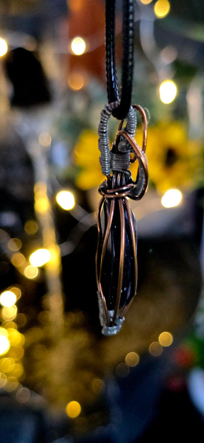 The Blues – Handcrafted Blue Sandstone Pendant with Copper & Steel Weave